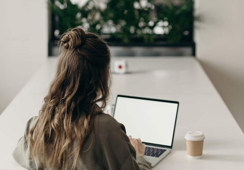 Woman Using Laptop