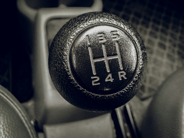 a close up of a car's gear stick